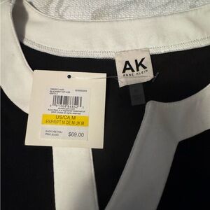 New with tags Anne Klein black blouse with white trim short sleeves medium size